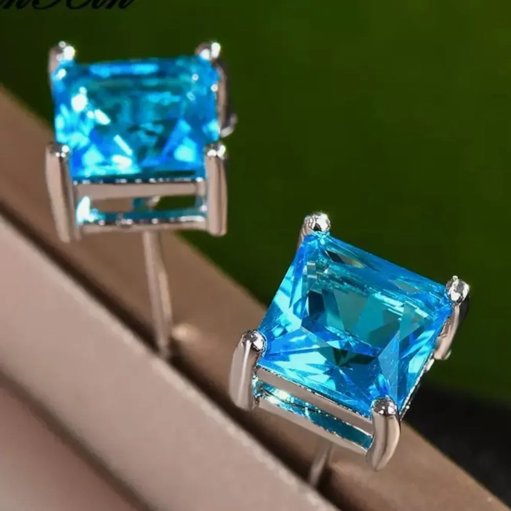 Crystal blue stone square stud earrings.
